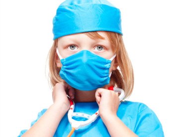 photodune-4830846-boy-with-long-blond-hair-playing-doctor-xs